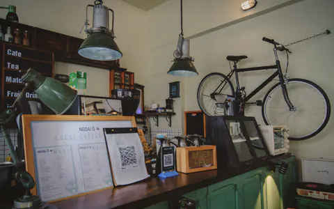 The counter: menu boards, the radio and the bike on the wall